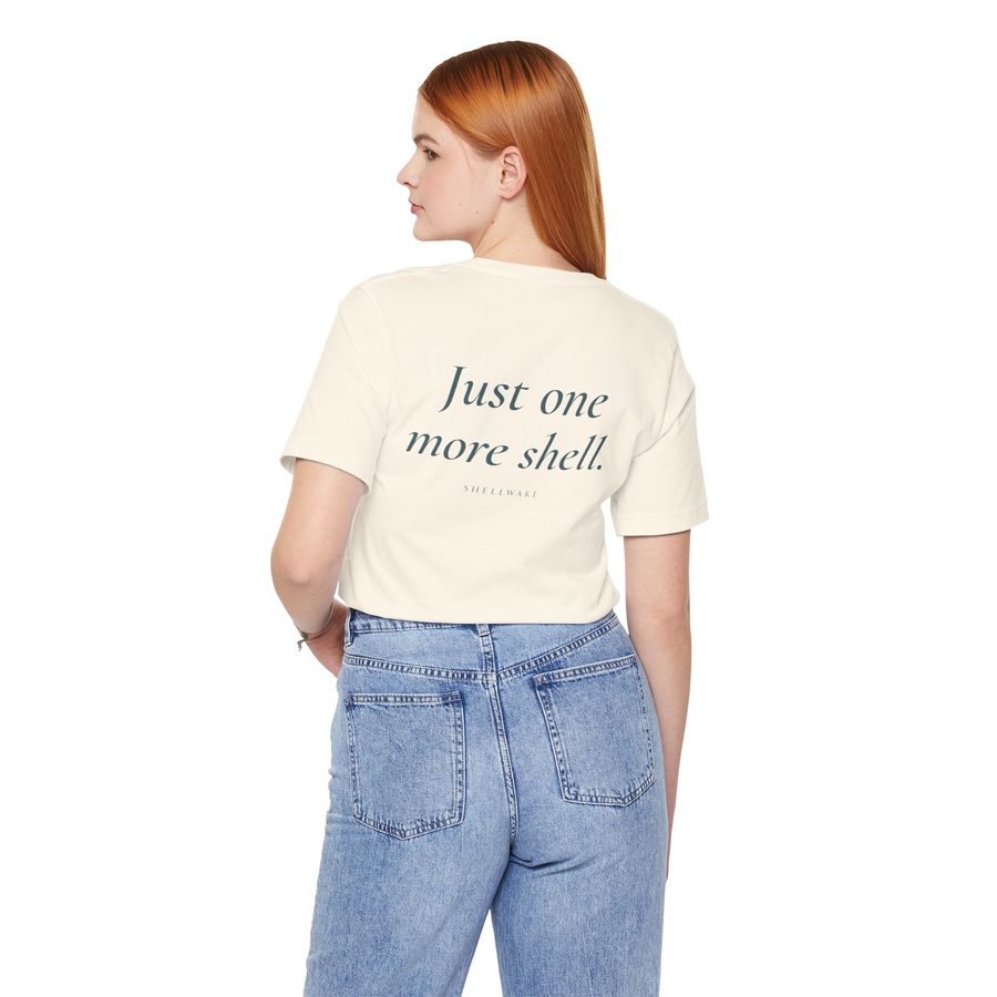 Back of the tee with the phrase Just one more shell.